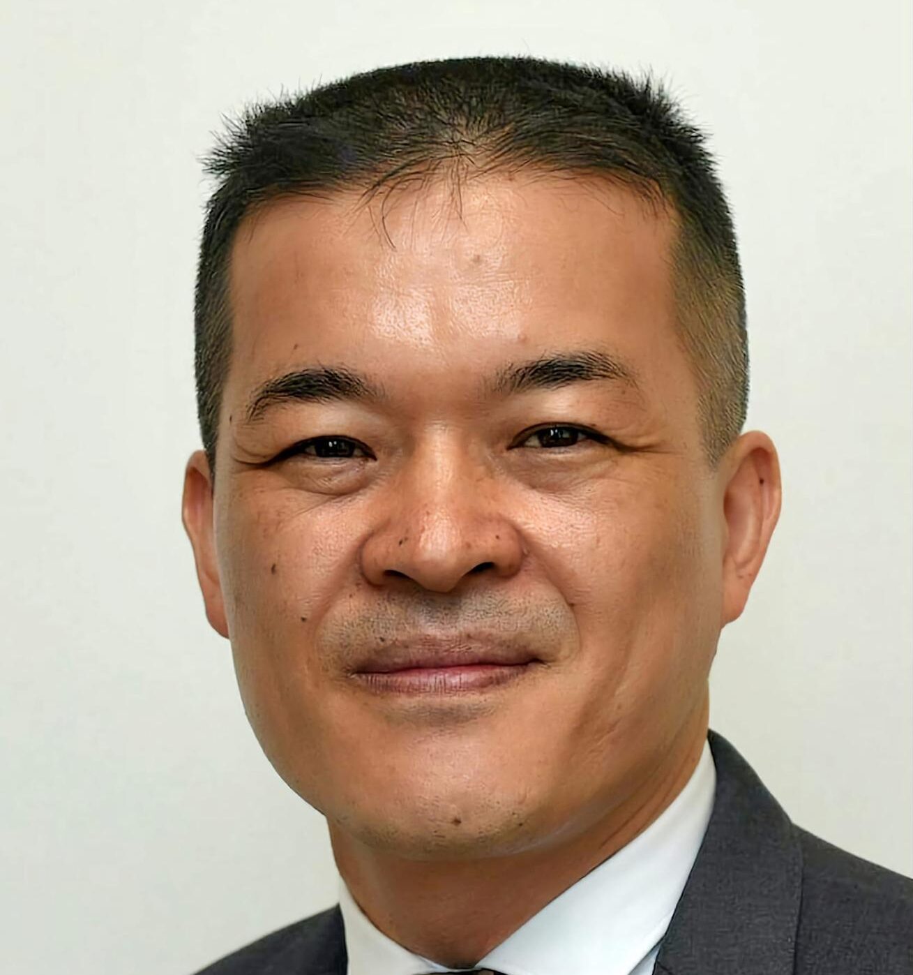 Dr. Kan Yuk Man 